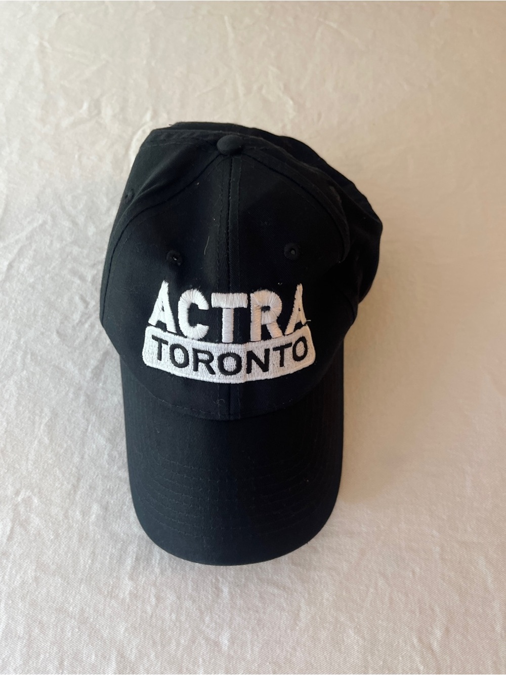 Actra Black Baseball Cap with White Embroidered Logo
